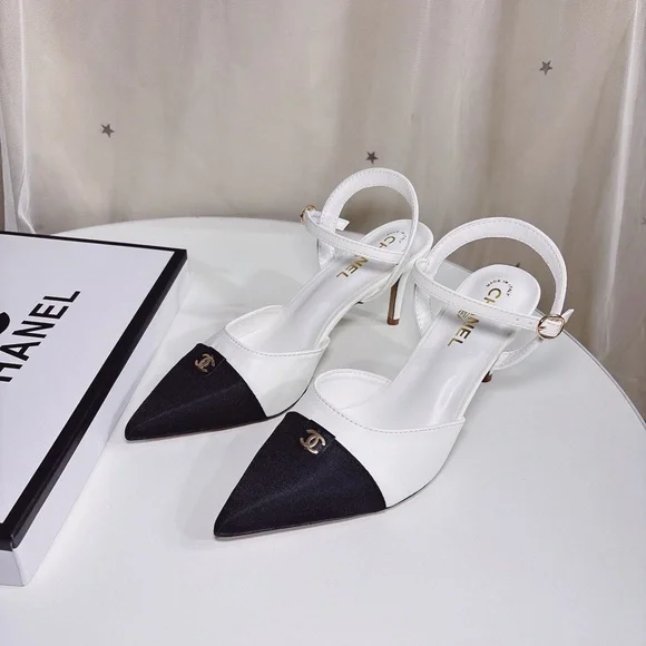 CHANEL Elegant Black and White Heels - Picture 3 of 9